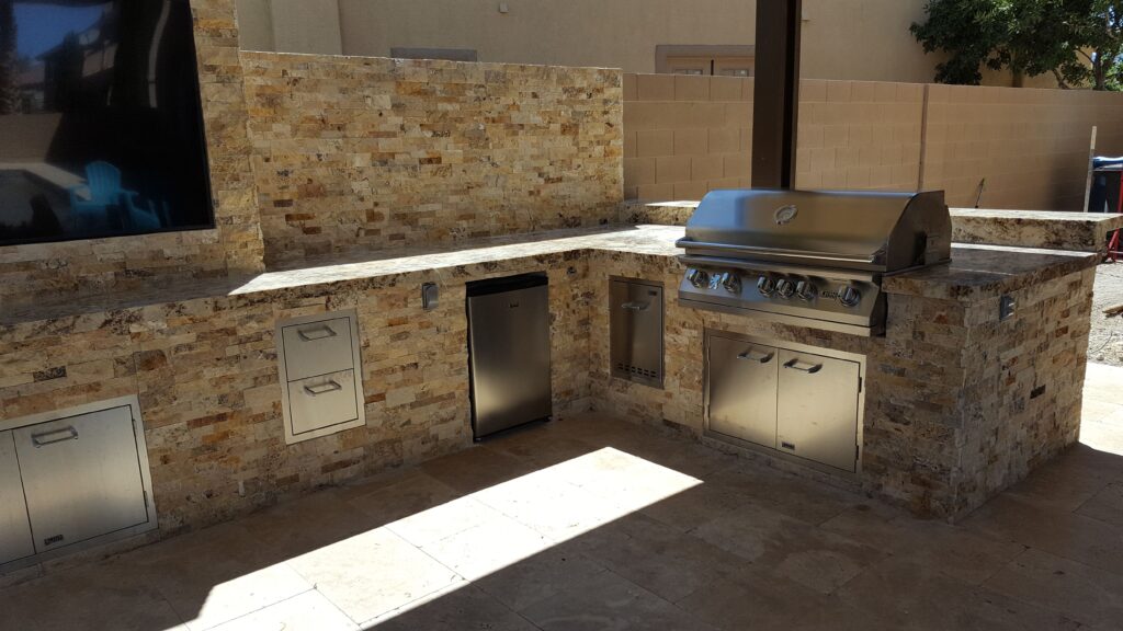 outdoor kitchen ledger stone granite top