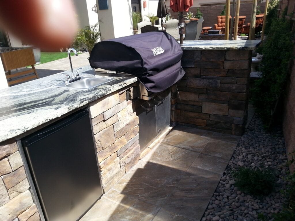Pellet smoker built into a custom BBQ island by Sun West Outdoor Kitchens in Las Vegas