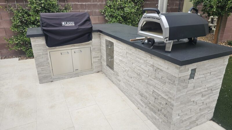 L-Shaped BBQ Island with Pizza Oven in Seven Hills, Henderson